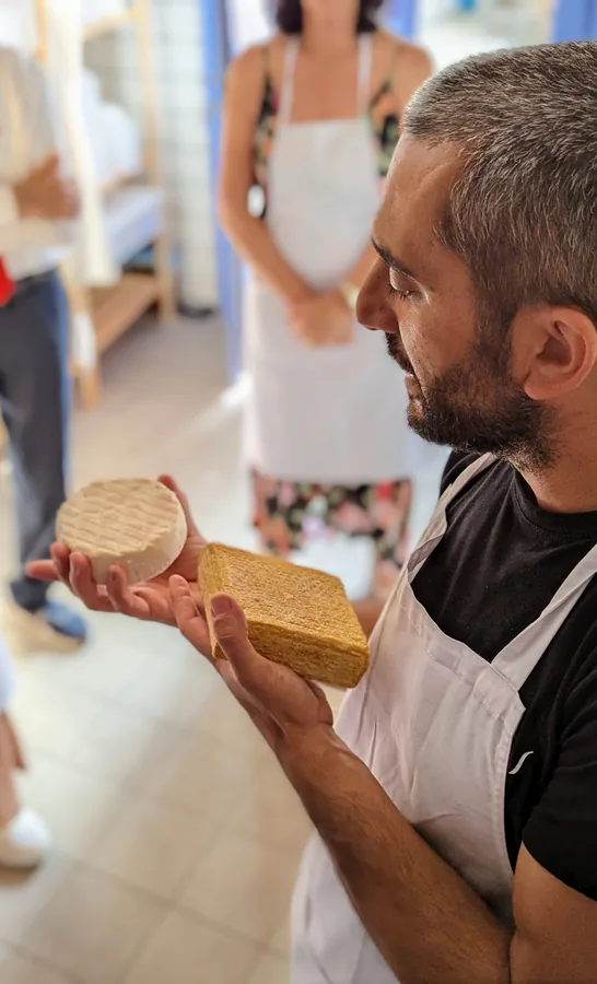 Working beside the master cheesemaker