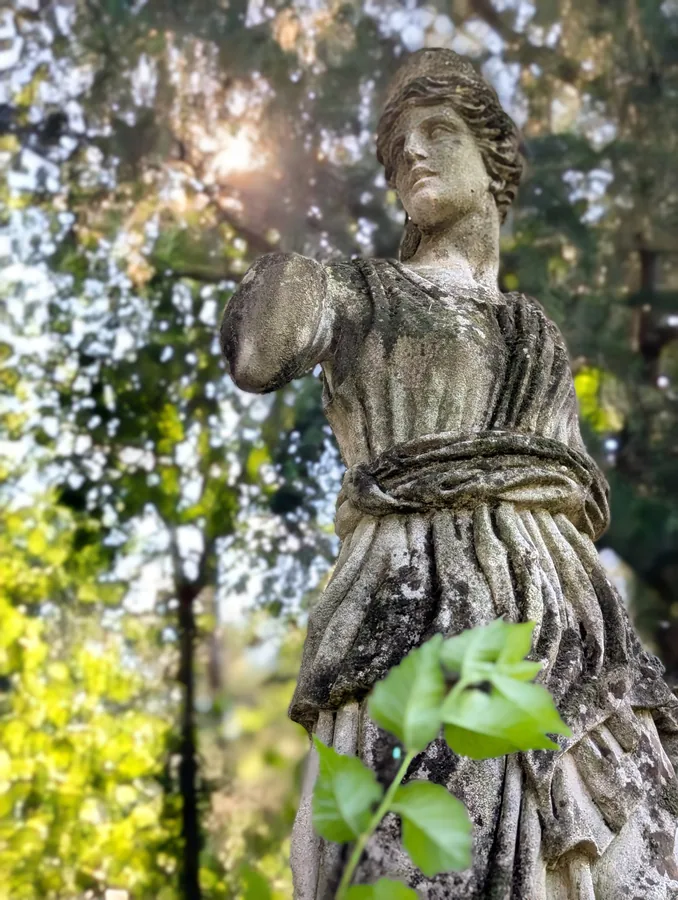 A statue in a villa garden